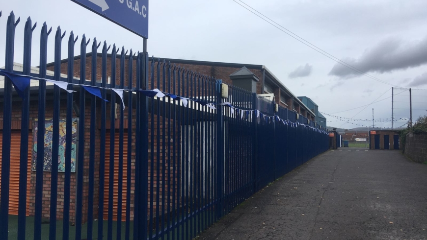 Corrigan bedecked in blue and white